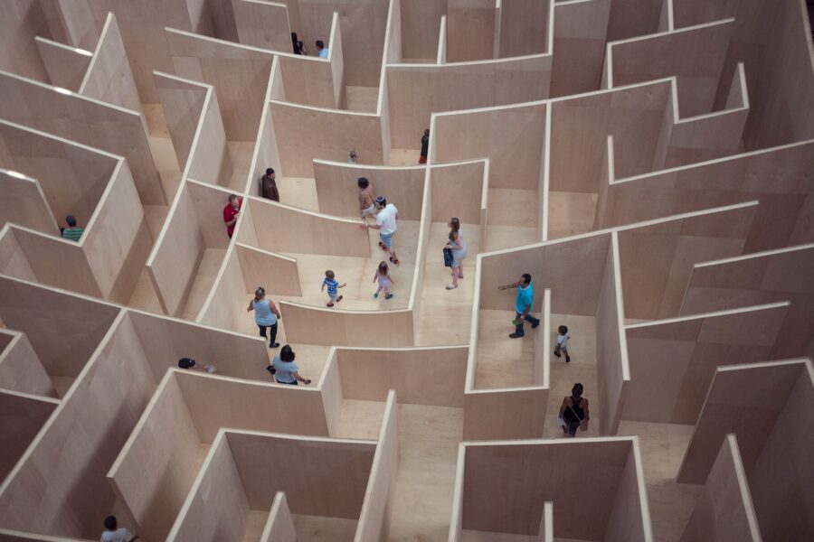 a maze showing people walking inside